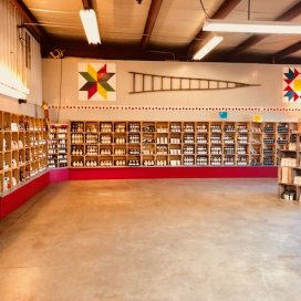 Retail Corner with ladder and quilts